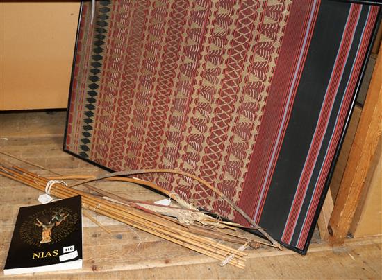 Large Indonesian textile, group of bows & arrows & a book